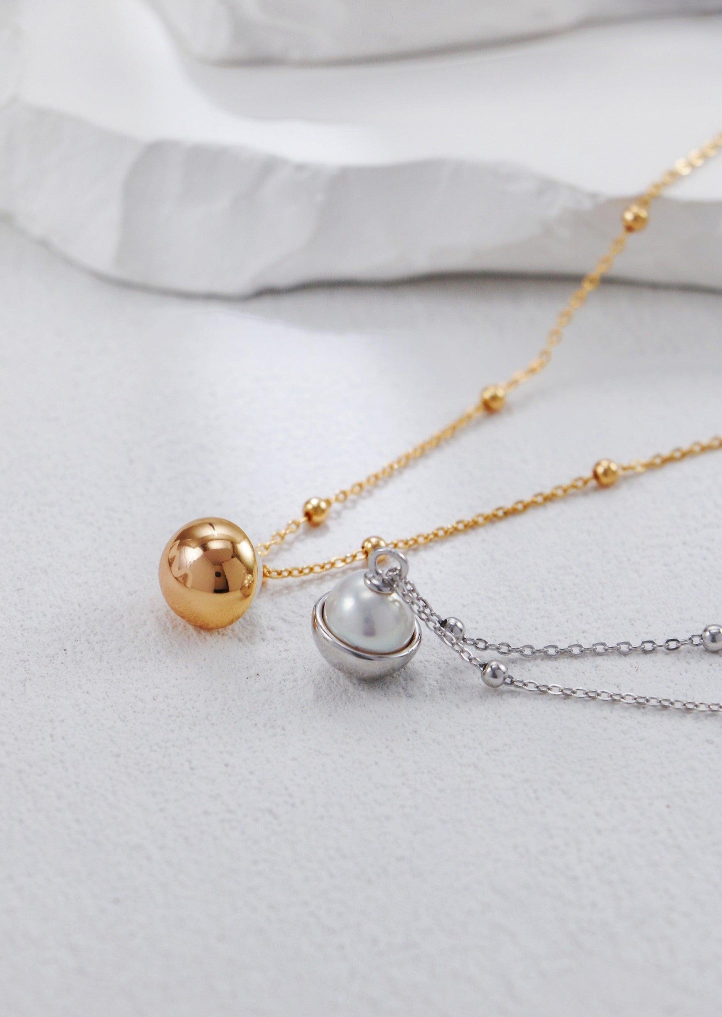 Silver & Pearl Flying Disc Necklace