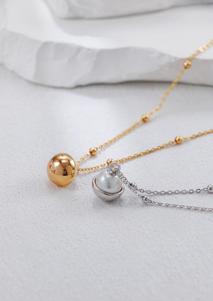Silver & Pearl Flying Disc Necklace